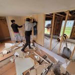 Workers from Reed's Demolition & Cleanouts LLC working on an interior demolition job