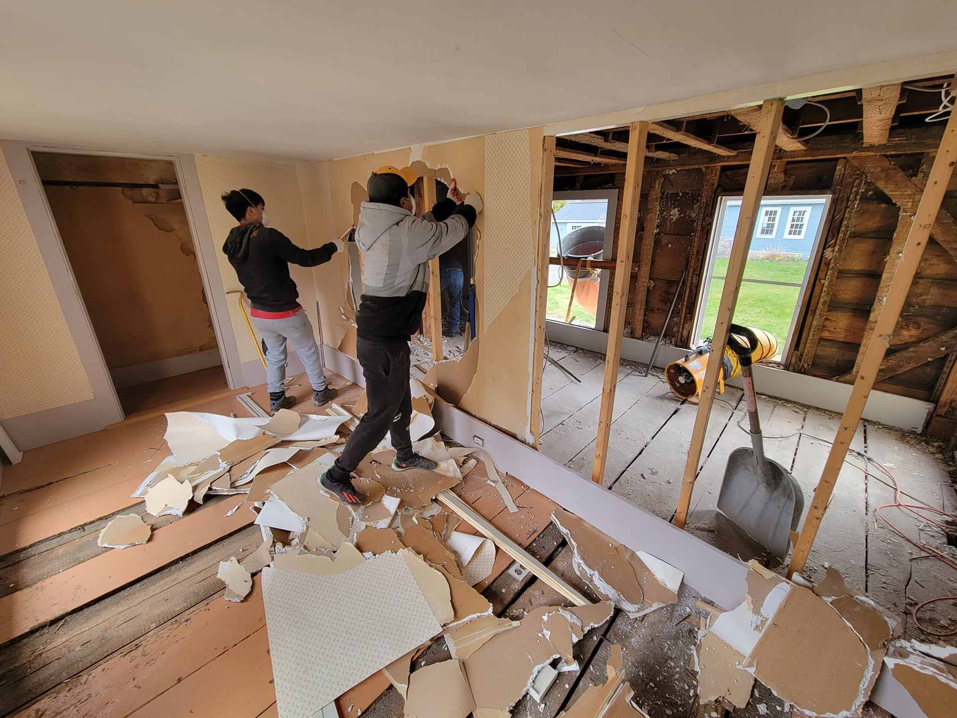 Workers from Reed's Demolition & Cleanouts LLC working on an interior demolition job