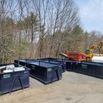 Rental dumpsters from Reed's Demolition & Cleanouts LLC on lot